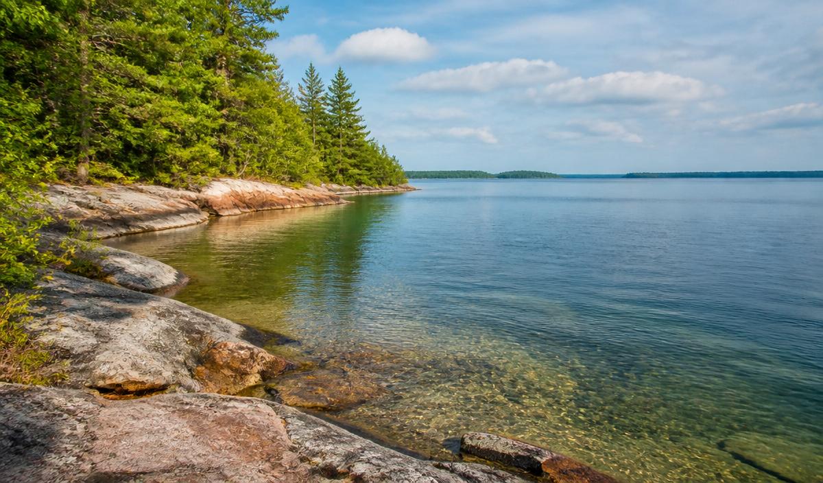 Rocky Wisconsin shoreline and clear lake water